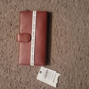 Brand new red leather wallet. Tags still on